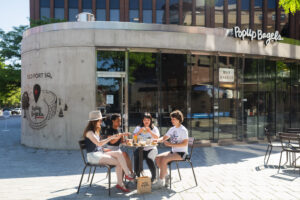 Friends at PopUp Bagels. Photo Credit: Capshore Photography.