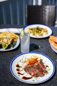 Meal at Saltwater Grille. Photo Credit: Capshore Photography.