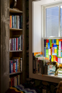 Bookshelf at Black Elephant Hostel. Photo Credit: Capshore Photography.