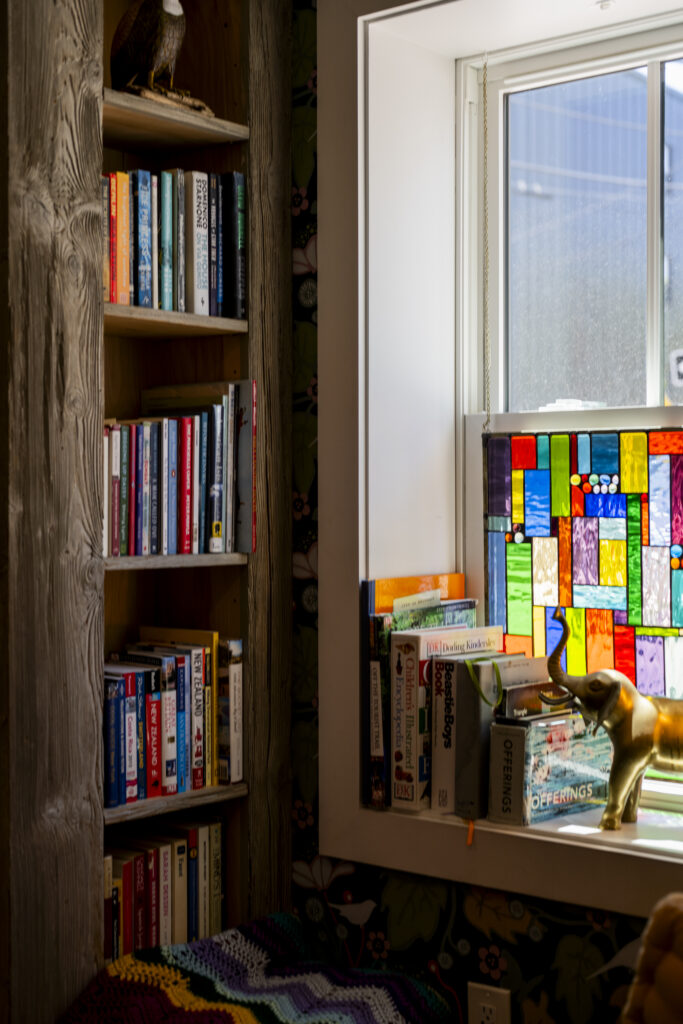 Bookshelf at Black Elephant Hostel. Photo Credit: Capshore Photography.