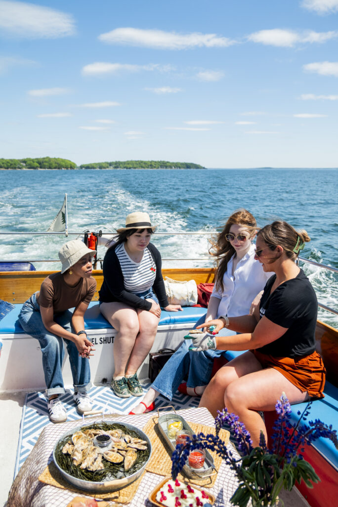 Oyster Tour with Nauti Sisters Sea Farm and On the Rocks Cocktail Cruise. Photo Credit: Capshore Photography