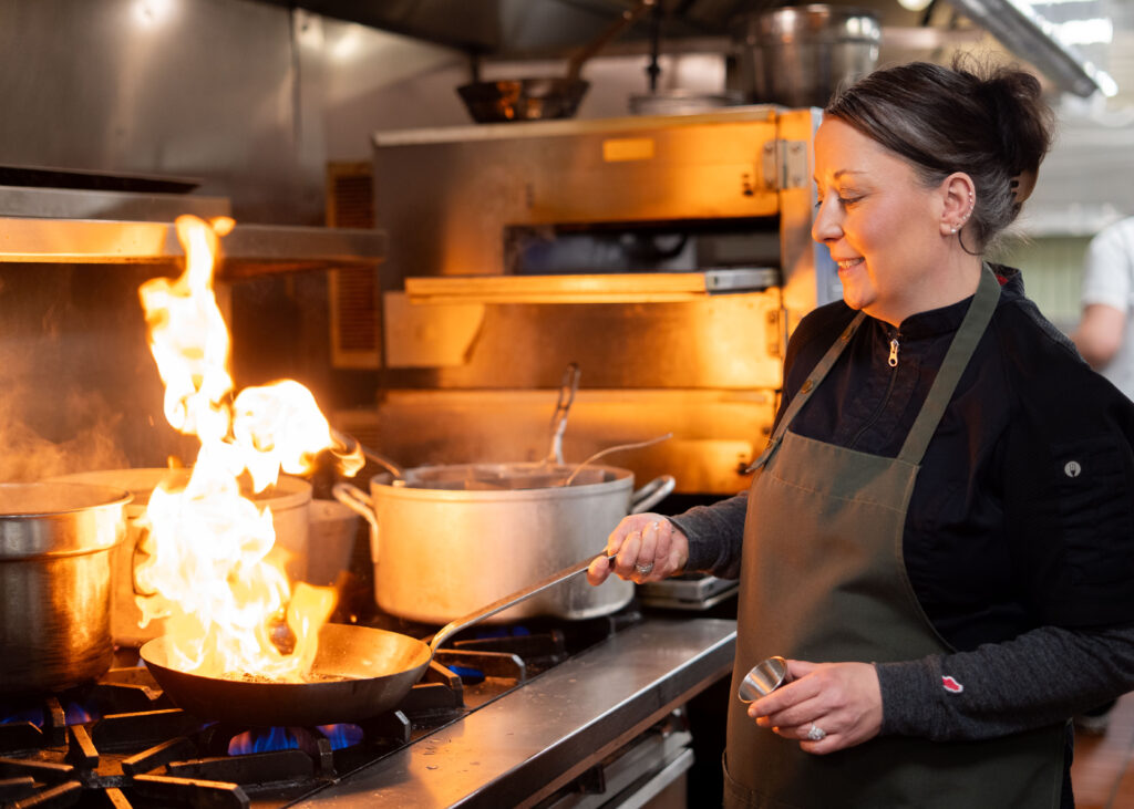 Chef Cooking at DiMillo's. photo credit: Avery Lehman