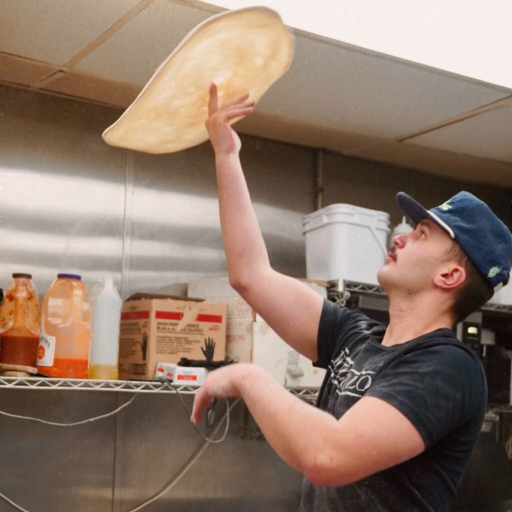 Pizza Being Thrown. Photo provided by: Pizzaiolo