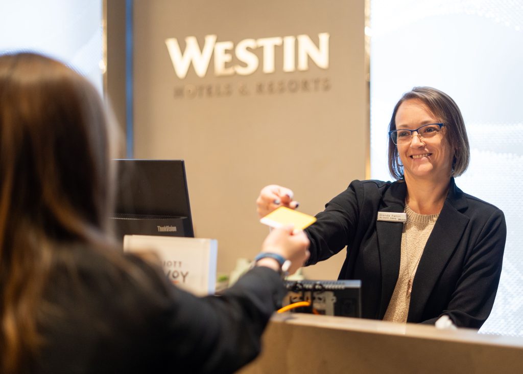 Person Checking into Westin Portland Harborview Hotel. photo credit: Avery Lehman