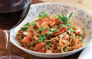 Close-up bowl of pasta next to glass of red wine - Photo courtesy of: Wine Wise Events