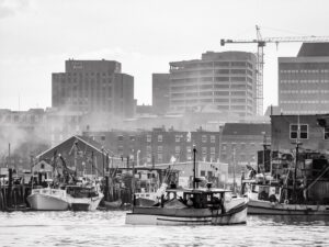 Lapsed Time - Photo Credit: Fishing boats with banks near Widgery and Union Wharfs in Portland, September 1987; photo by David Etnier